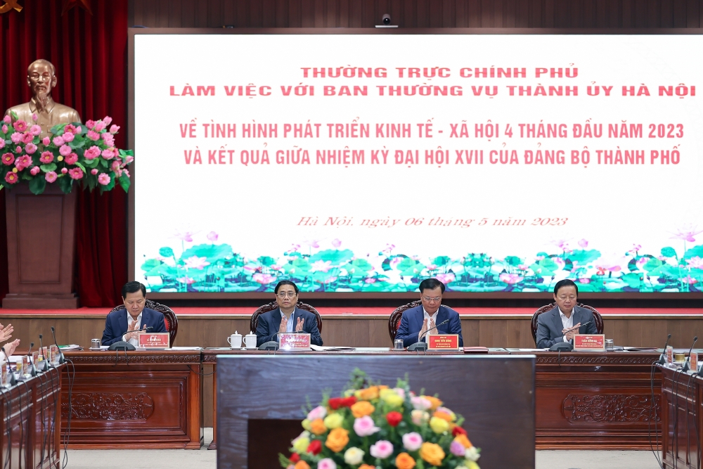 Thủ tướng Phạm Minh Chính chủ trì cuộc làm việc của Thường trực Chính phủ với Ban Thường vụ Thành ủy Hà Nội - Ảnh: VGP