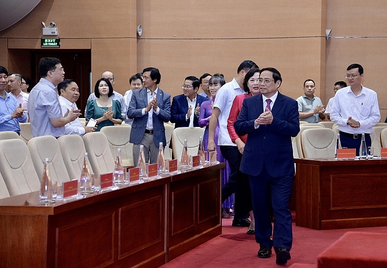 Thủ tướng Phạm Minh Chính tới dự Hội nghị sơ kết hoạt động ngân hàng 6 tháng đầu năm và triển khai nhiệm vụ 6 tháng cuối năm 2023. (Ảnh: THANH GIANG)