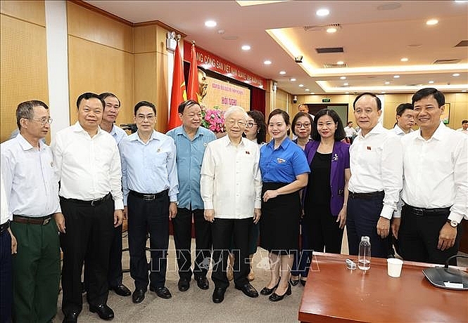 Tổng Bí thư Nguyễn Phú Trọng với các đại biểu và cử tri - Ảnh: TTXVN