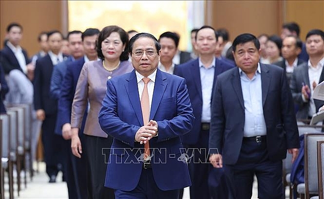 Thủ tướng Phạm Minh Chính tham dự và chủ trì Hội nghị triển khai nhiệm vụ điều hành chính sách tiền tệ năm 2024. Ảnh: Dương Giang/TTXVN