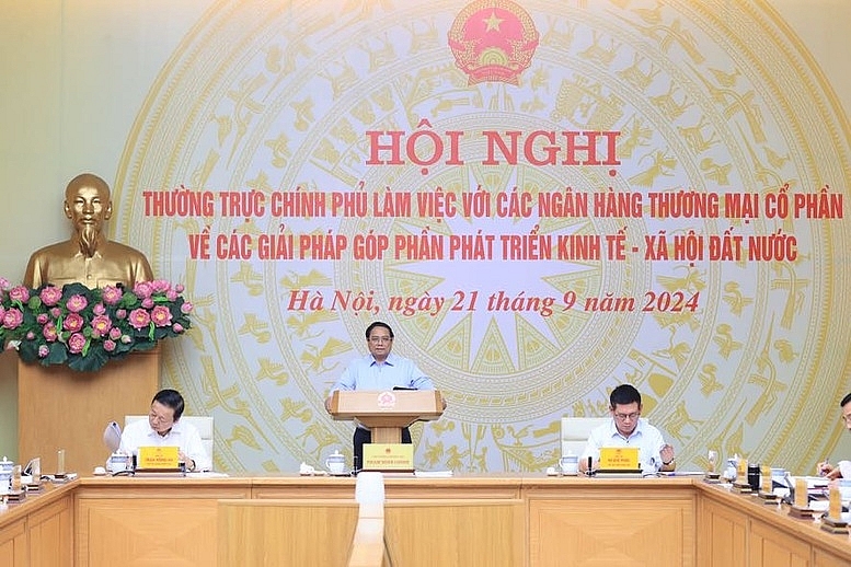 Thủ tướng Chính phủ Phạm Minh Chính chủ trì Hội nghị Thường trực Chính phủ làm việc với các ngân hàng thương mại cổ phần về các giải pháp góp phần phát triển kinh tế - xã hội đất nước - Ảnh: VGP