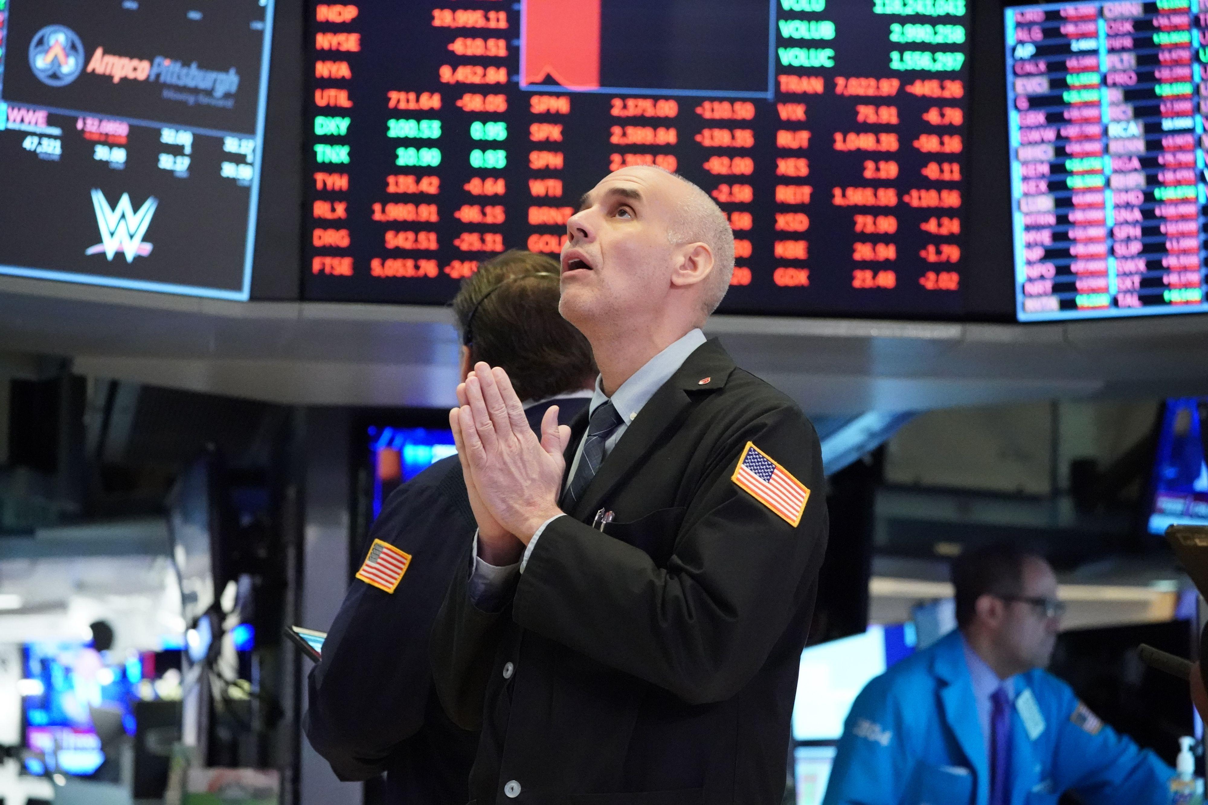 Dow Jones giảm 179 điểm phiên cuối tuần, nhóm công nghệ tiếp tục khởi sắc - Ảnh 1.